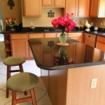 Black Granite with light Maple cabinets
