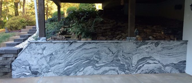 Garden Wall cladded with Silver Cloud granite in a St. Louis home garden