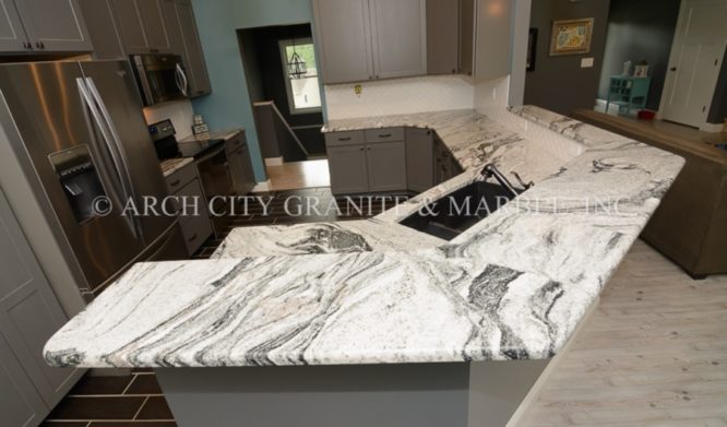 Silver Cloud Granite Countertops with Grey tone Cabinets – by Arch City Granite