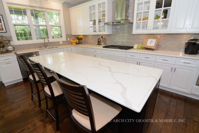 Kitchen Countertops with Calcatta Classique Q-Quartz, White and Espresso cabinets’ combination