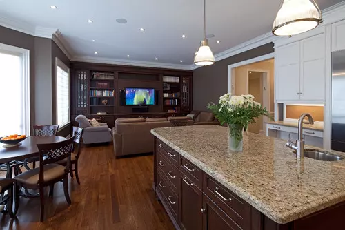 grey granite countertops with brown cabinets