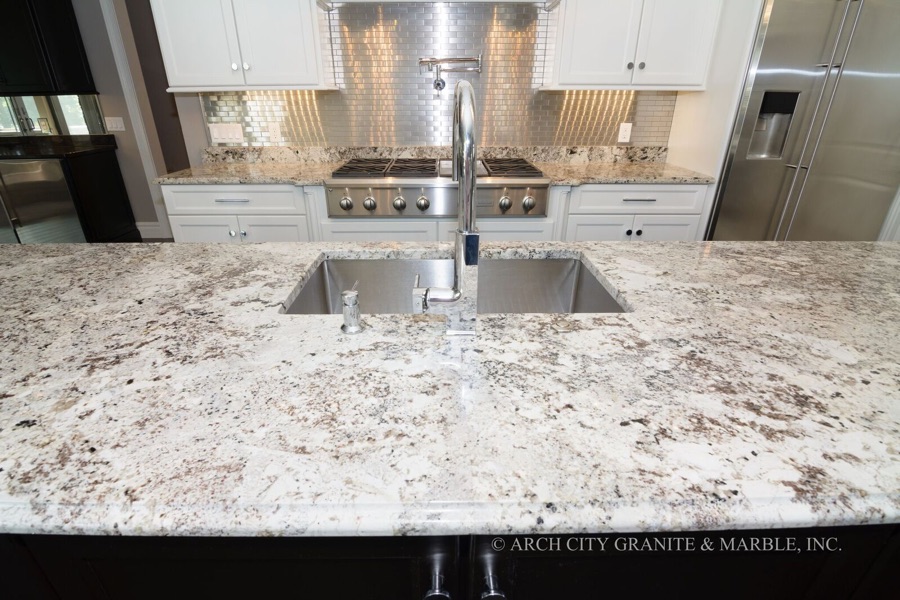 White Granite with gray, black and blue minerals