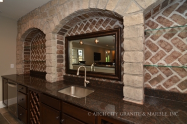 Coffee Brown granite countertops with brick and stone work in illinois