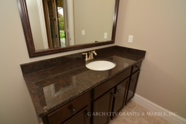 Dark brown granite vanity top with Espresso cabinets in the st. louis area