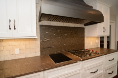 Full-Height Granite back splash behind the Stove area in illinois home