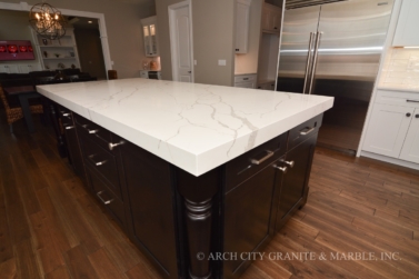 Quartz Kitchen island with a thick mitered edge in illinois