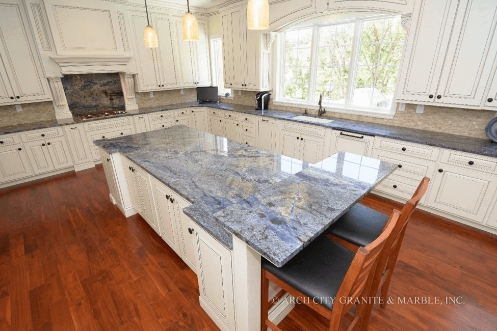 Blue granite countertop in a white kitchen