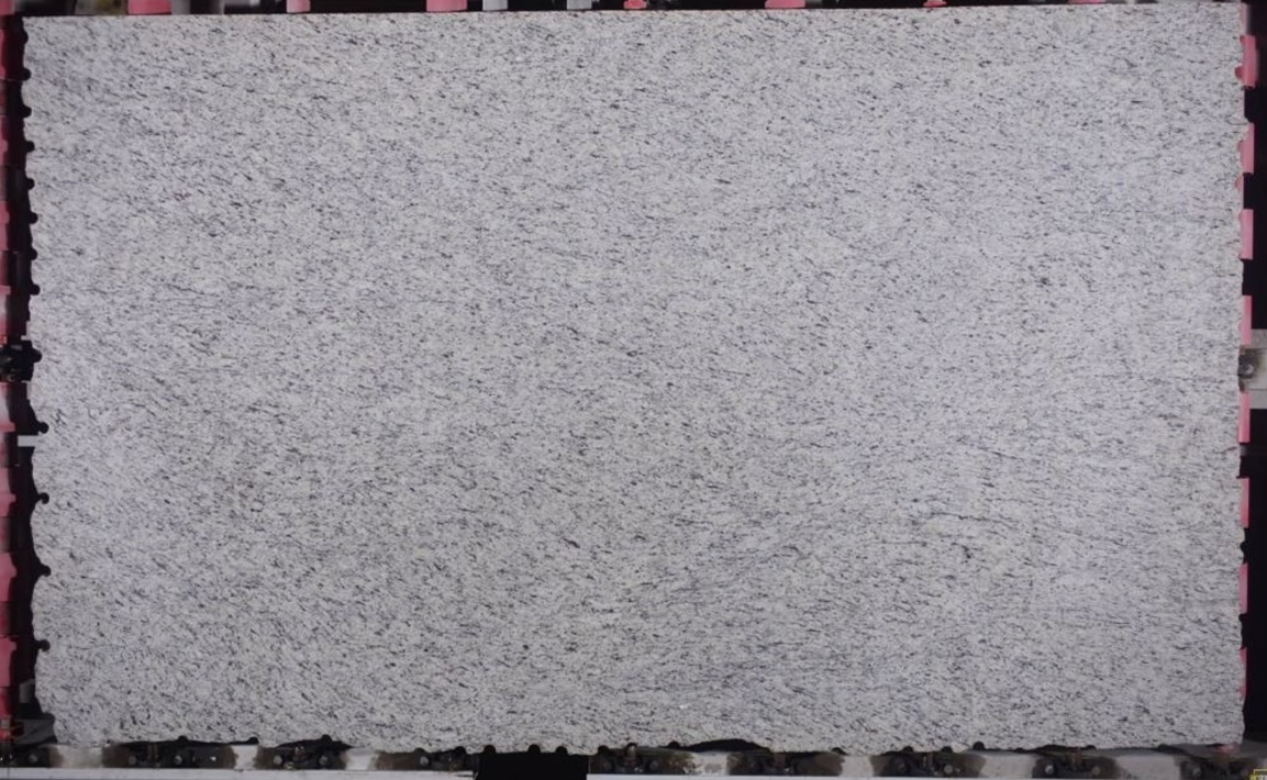Ornamental White - A light granite from Brazil with soft white, creams, taupes, tans and grays