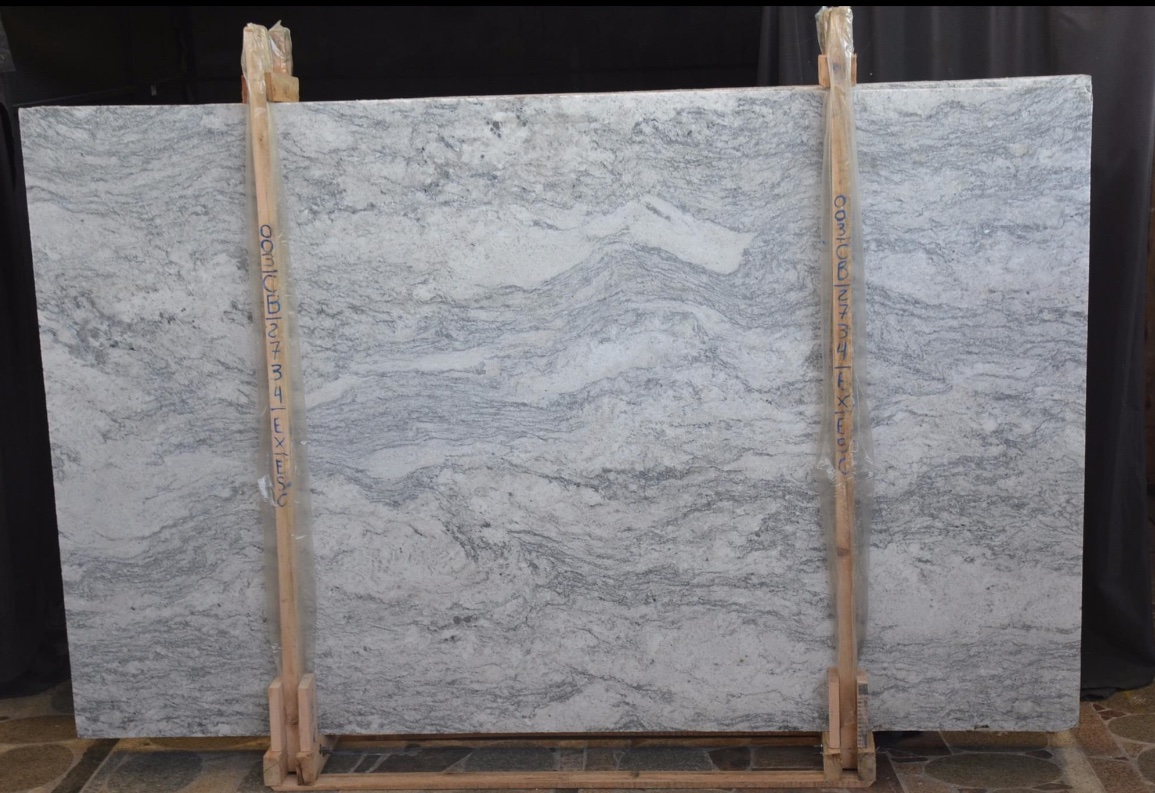 White Valley - A new white granite color from Brazil with abundance of gray veining running throughout the slab