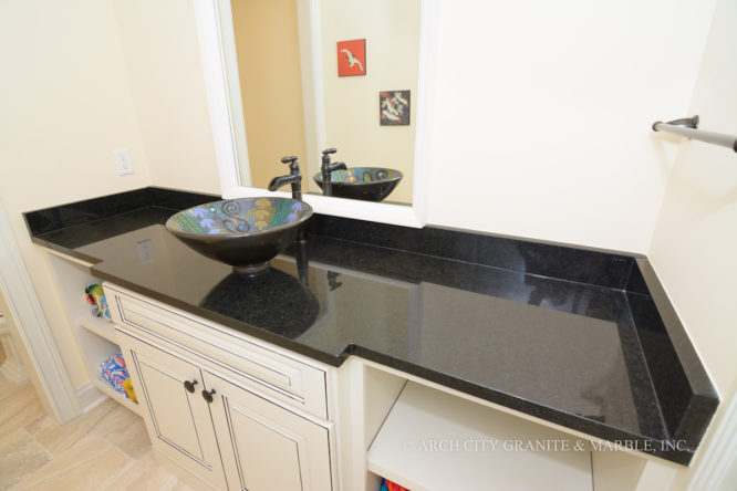 Black Pearl granite imported from India, installed with a matching vessel bowl in st louis
