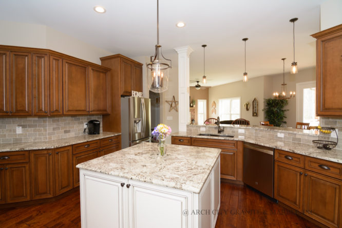 Alaska White granite with two toned cabinetry installed in Wentzville, MO