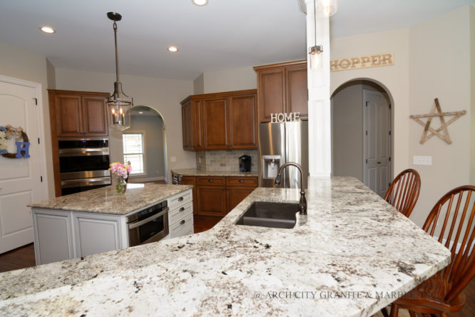 Blanco Silgranit sink mounted with Alaska White granite kitchen in missouri