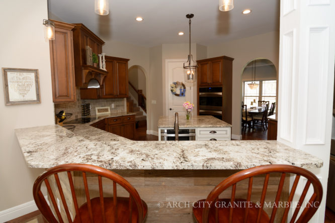 Granite countertop in missouri kitchen with overhang extension for bar stools
