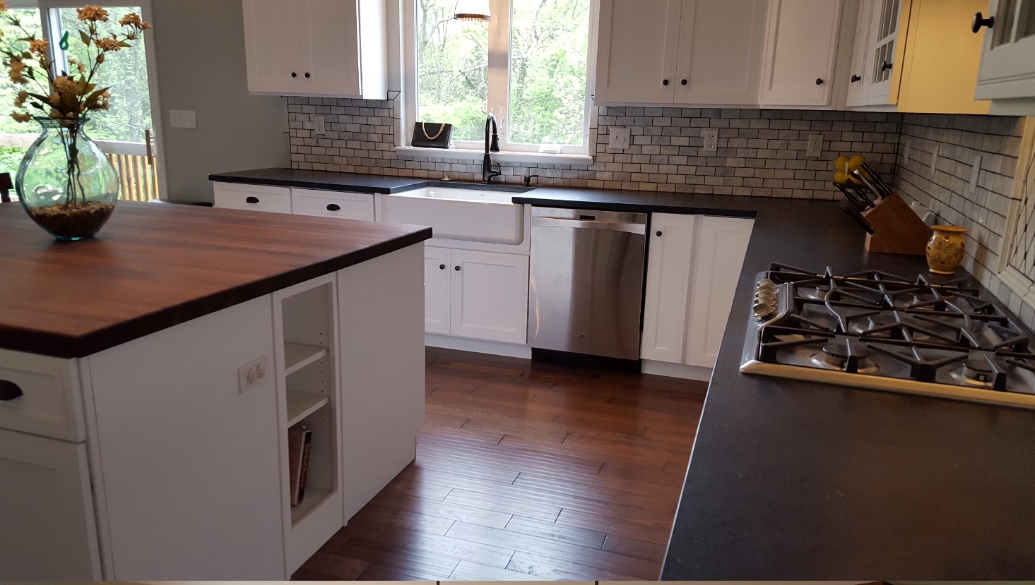 Soapstone kitchen countertops with a butcher block island in st. louis